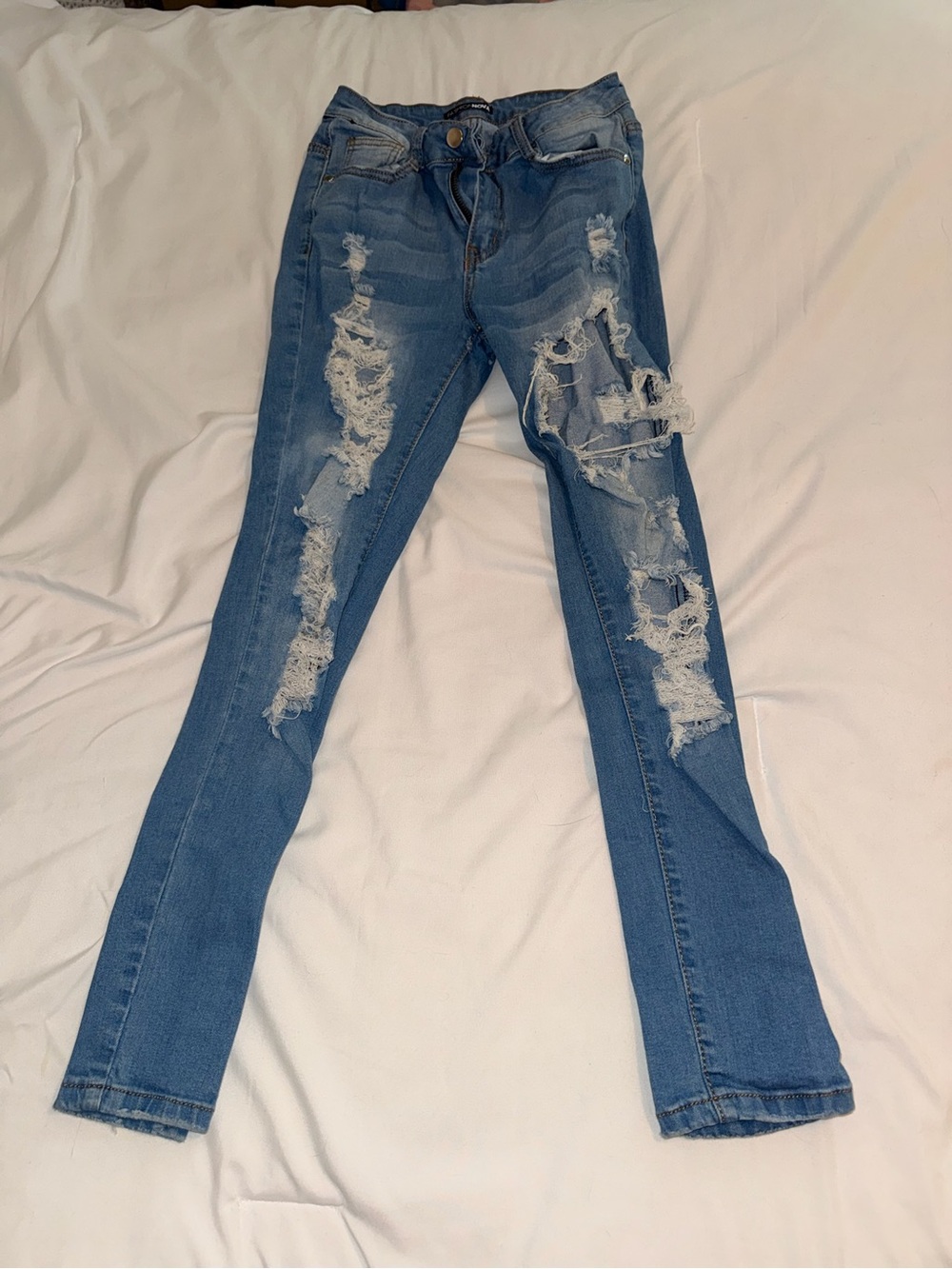 Fashion Nova Light Blue Ripped Skinny Jeans